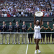 Victorious again. Williams holds up the Wimbledon ladies championship trophy and garners the £1.88m ($2.7m) prize.